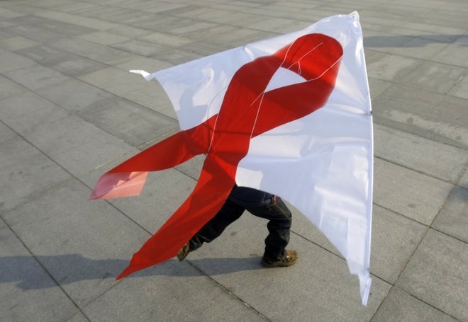 34 ljudi se je lani v Sloveniji okužilo z virusom HIV. FOTO: Š Jason Lee/Reuters 