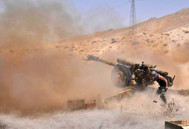Pripadniki sirske vojske v bitki za mesto Palmira. (Foto - AFP Photo)