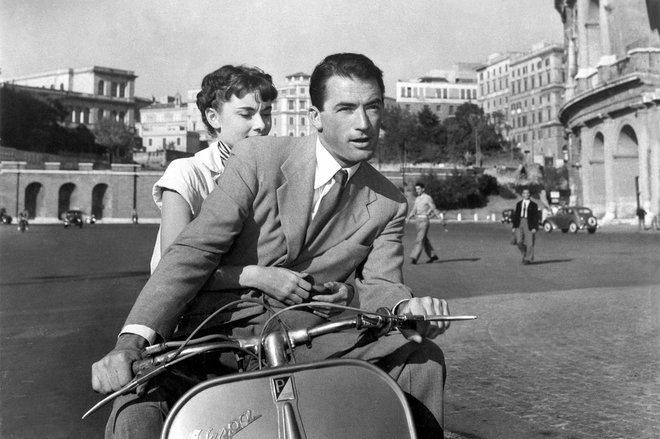Rimske počitnice z Gregoryjem Peckom in Audrey Hepburn v glavni vlogi, so posneli tudi v Koloseju. FOTO: Promocijsko gradivo