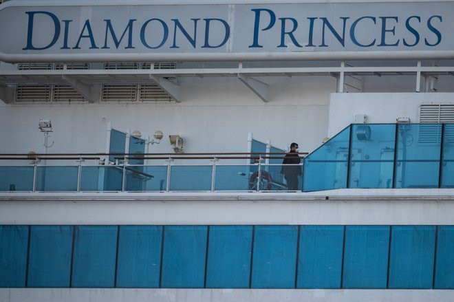 Na križarki Diamond Princess je bilo šest slovenskih potnikov. FOTO: Philip Fong/AFP