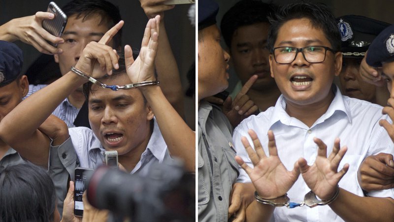 Fotografija: Kyaw Soe Oo (levo) in Wa Lone so obsodili zaradi poročanja o nasilju nad muslimansko manjšino. FOTO: Thein Zaw/AP
