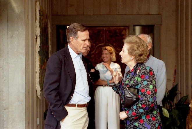Z ameriškim predsednikom Georgeem Bushem starejšim Foto AFP