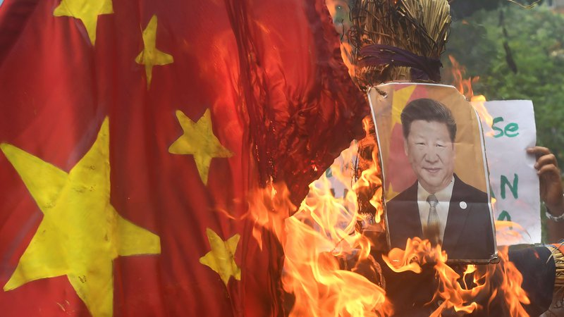 Fotografija: Xi Jinping si želi utrditi oblast in svojemu ljudstvu dokazati, da ne bo nihče več od zunaj – ne Amerika ne Indija – izzival svete zemlje pod kitajsko suvereniteto. FOTO: Dibyangshu Sarkar/AFP