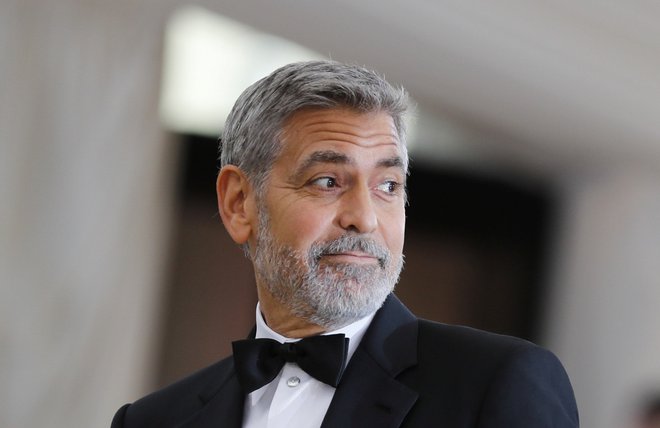 Hollywoodski zvezdnik George Clooney se je zaradi prodaje svoje znamke tekile zavihtel na drugo mesto. FOTO: Reuters/Carlo Allegri