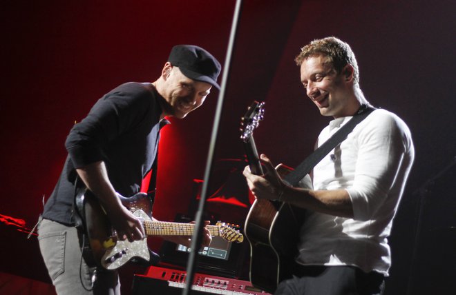 Skupina Coldplay je z dvoletno turnejo zaslužila dovolj, da so se uvrstili na sedmo mesto . FOTO: AP/Jack Plunkett
