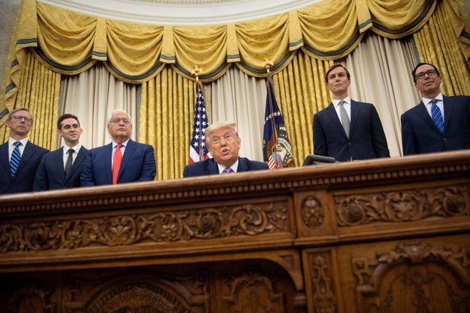 Donald Trump je dogovor označil za »ogromen preboj. FOTO: Brendan Smialowski/AFP