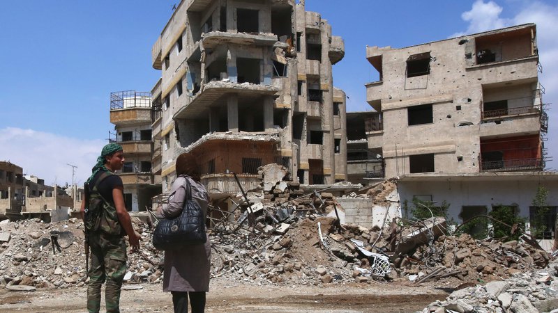Fotografija: Uničenje po bombardiranju v Ghouti.