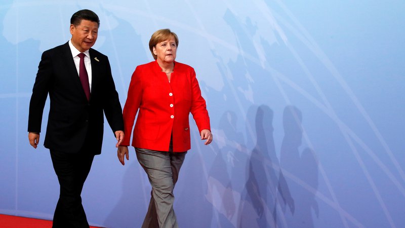 Fotografija: Xi Jinping in Angela Merkel. FOTO: Wolfgang Rattay/Reuters