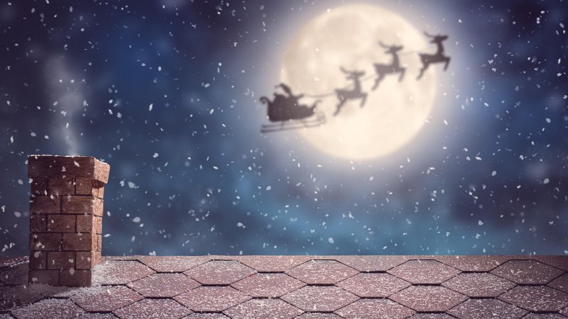 Fotografija: Merry Christmas and happy holidays! Santa Claus flying in his sleigh on background moon sky. Christmas story concept. Foto Choreograph Getty Images/istockphoto
