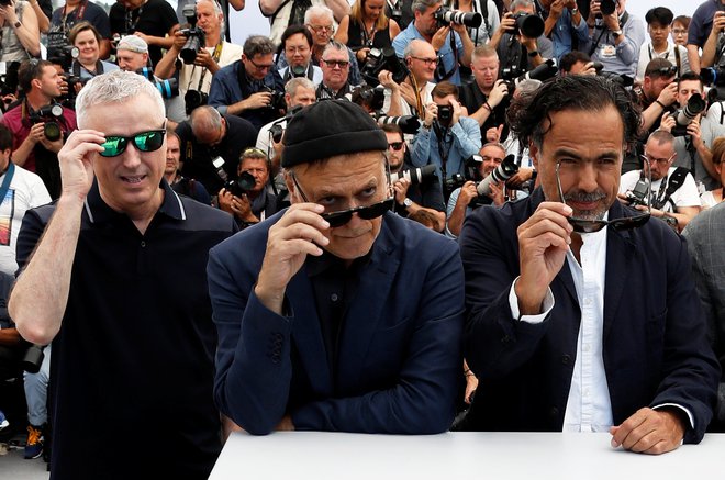 Sodniška ekipa 72. festivala: mehiški režiser Alejandro Gonzalez Iñárritu, Robin Campillo in Enki Bilal. FOTO: Eric Gaillard/Reuters