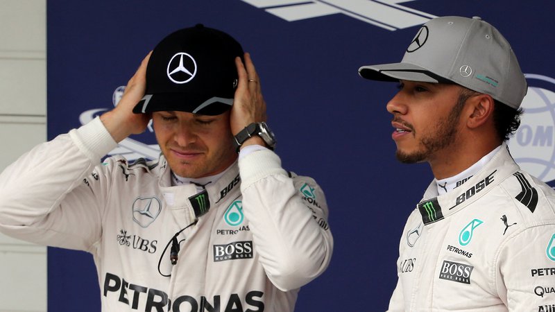 Fotografija: Nico Rosberg in Lewis Hamilton sta bila nekoč sotekmovalca, zdaj bosta tekmeca. FOTO: Paulo Whitaker/Reuters