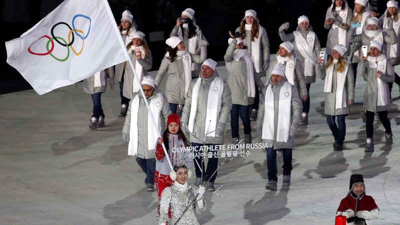 Fotografija: Na zadnjih igrah v Pjongčangu so kaznovani ruski športniki morali nastopiti brez nacionalnih simbolov. FOTO: Matej Družnik/Delo