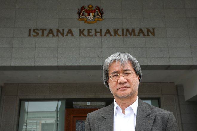Odgovorni urednik portala Malaysiakini Steven Gan pred zveznim sodiščem v Putrajayi. FOTO: Lim Huey Teng/Reuters