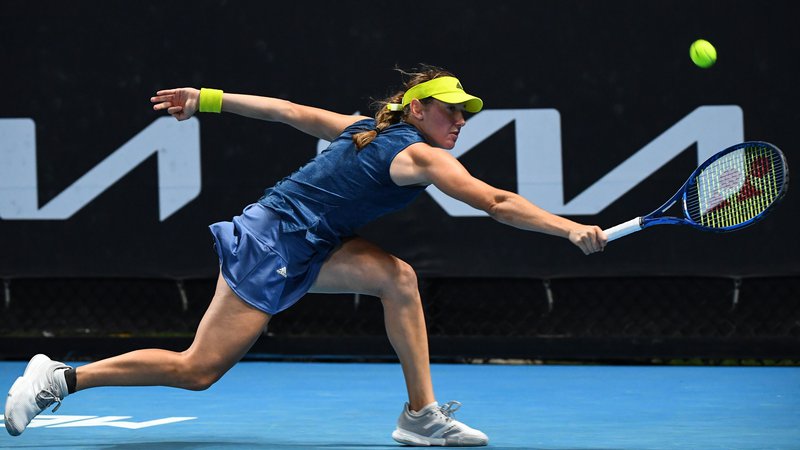Fotografija: Kaja Juvan se je zavoljo dobrega nastopa na OP Avstralije povzpela na 91. mesto lestvice WTA. FOTO: William West/AFP