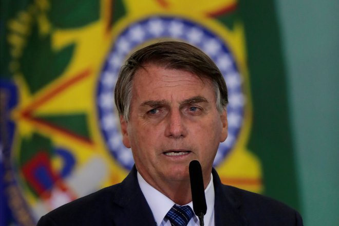 Bolsonaro ovira sprejemanje ukrepov. FOTO: Ueslei Marcelino/Reuters
