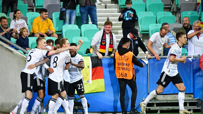 Fotografija: ManCityjev nemški napadalec Lukas Nmecha je z mojstrskim golom v 49. minuti odločil sinočnji finale med Nemčijo in Portugalsko v Stožicah. FOTO: Jure Makovec/AFP