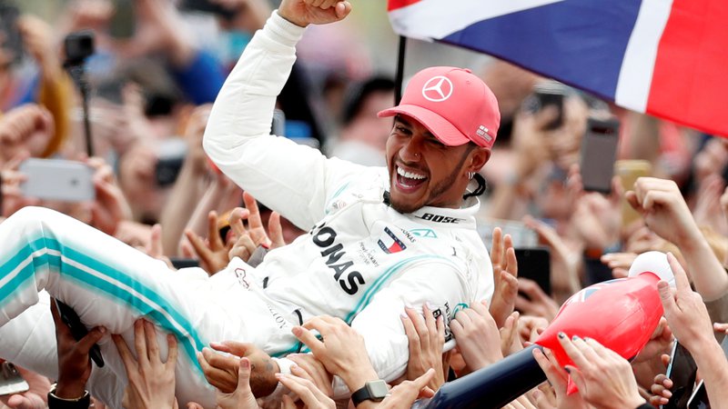 Fotografija: Pred dvema letoma se je Lewis Hamilton veselil zmage v Silverstonu. FOTO: Matthew Childs/Reuters