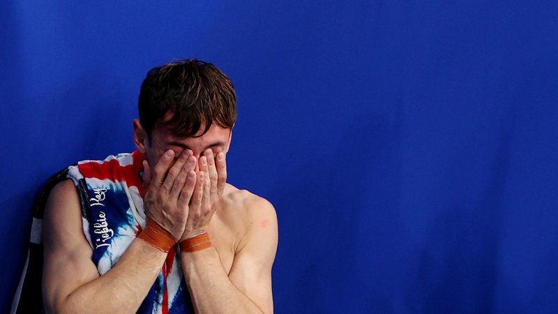 Fotografija: Po trinajstih letih v svetovnem vrhu je Tom Daley osvojil olimpijsko zlato. FOTO: Marko Djurica/Reuters
