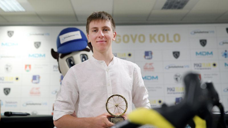 Fotografija: Tadej Pogačar je po drugi zmagi na Touru prvič osvojil Rogovo zlato kolo v članski konkurenci. FOTO: Blaž Samec
