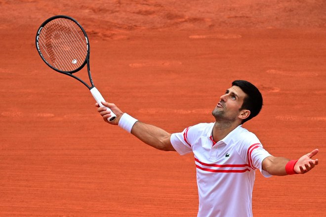 Novak Đoković utegne izpustiti tudi Roland-Garros. FOTO: Martin Bureau/AFP
