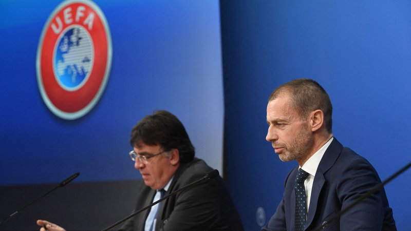 Fotografija: Predsednik Evropske nogometne zveze Aleksander Čeferin (desno) in Uefin generalni sekretar Theodor Theodoridis. FOTO: Reuters
