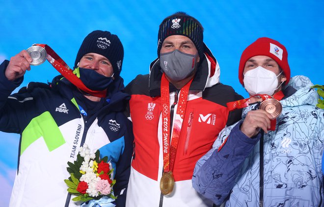 Na letošnjih olimpijskih igrah v Pekingu si je Vic Wild (desno) prideskal bronasto kolajno za srebrnim Timom Mastnakom (levo) in zlatim Benjaminom Karlom. FOTO: Kai Pfaffenbach/Reuters
