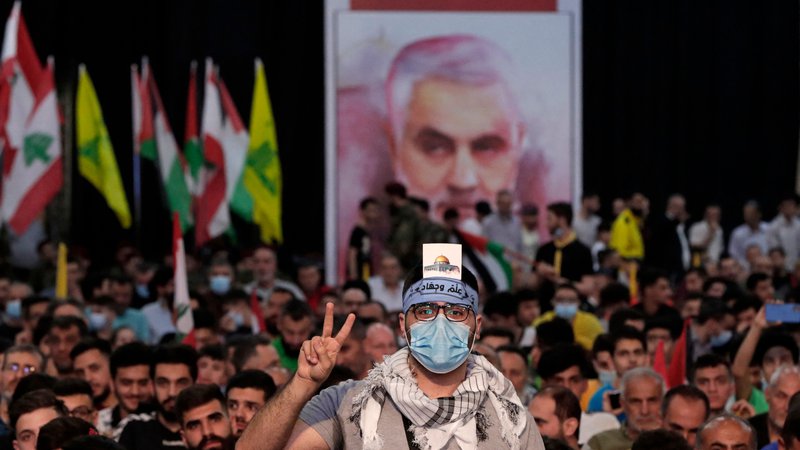 Fotografija: Podporniki šiitskega gibanja Hezbolah Foto Anwar Amro/AFP
