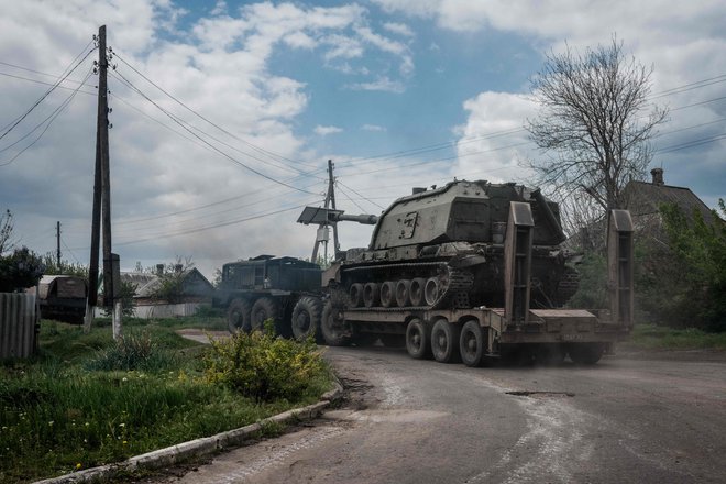 Spopadi na vzhodu Ukrajine se nadaljujejo. FOTO: Yasuyoshi Chiba/AFP
