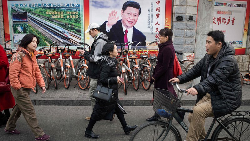 Fotografija: Kitajski predsednik Xi Jinping bo jutri pred delegati prebral poročilo, v katerem bo pomembna skoraj vsaka beseda. FOTO: Nicolas Asfouri/AFP

