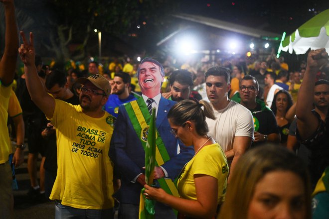Jair Bolsonaro se novemu predsedniku še ni oglasil. FOTO: Andre Borges/AFP
