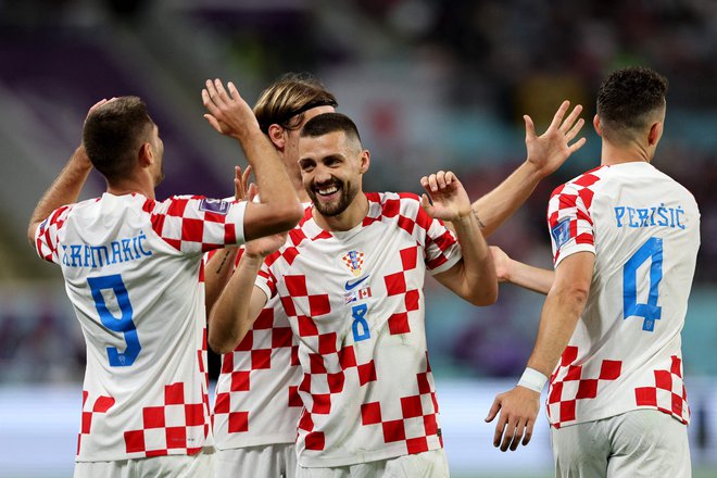 Hrvati so se na koncu veselili zanesljive zmage. FOTO: Adrian Dennis/AFP
