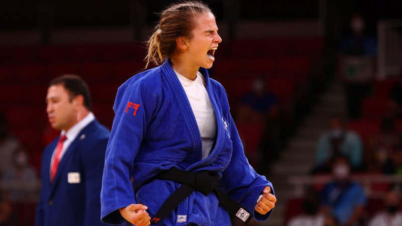 Fotografija: Naša judoistka se je veselila brona. FOTO: Sergio Perez/Reuters