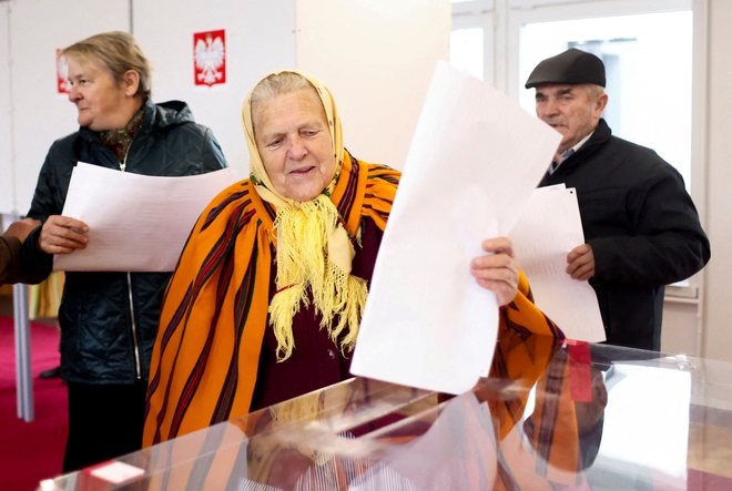 Udeležba na volitvah je bila visoka. FOTO: Lukasz Glowala/Reuters