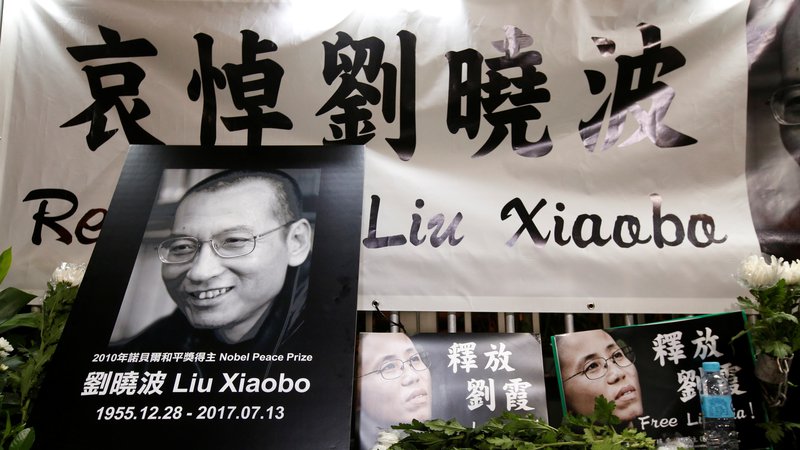 Fotografija: Liu Xiaobo je umrl 13. julija 2017. Med prestajanjem enajstletne kazni v zaporu v pokrajini Liaoning je preminil zaradi raka na jetrih. FOTO: Bobby Yip/Reuters