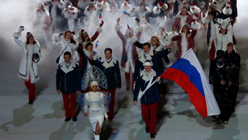 Fotografija: Pompozna otvoritvena slovesnost v Sočiju je za ruske športnike le še oddaljen spomin. FOTO: Adrian Dennis/AFP