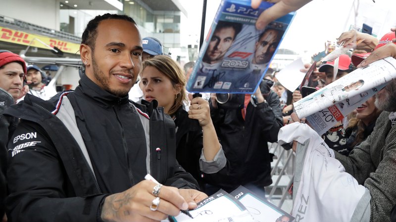 Fotografija: Lewis Hamilton je v Mehiki zmagal samo enkrat, si je pa tam zagotovil zadnja naslova svetovnega prvaka.
FOTO: Reuters