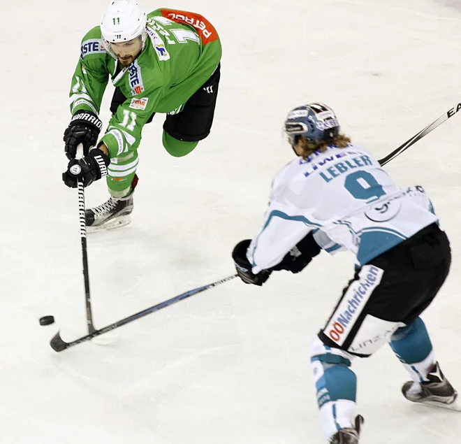 Žiga Pešut (v zelenem dresu) je bil junak Olimpijine zmage v Italiji. FOTO: Mavric Pivk/Delo