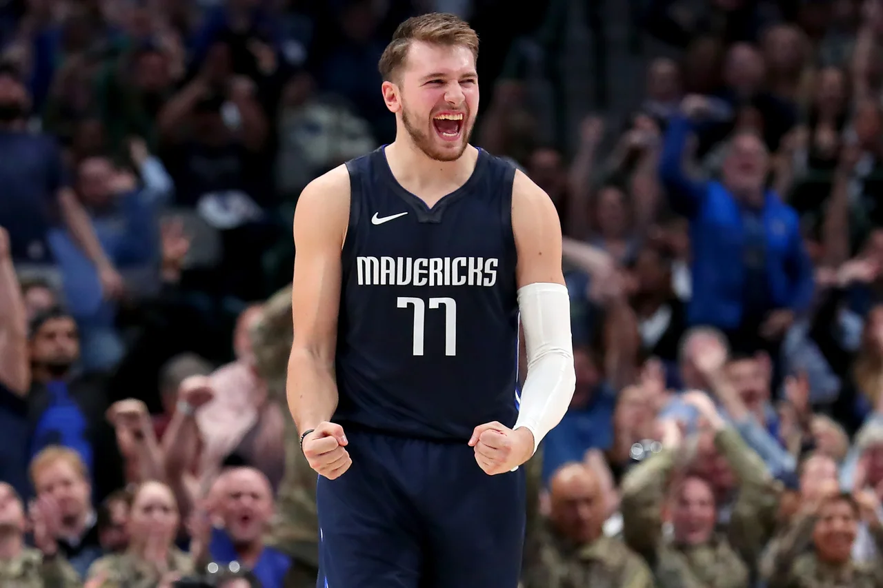 Fotografija: Luka Dončić je ohranil strelsko povprečje 27 točk na tekmo. FOTO: Tom Pennington/AFP