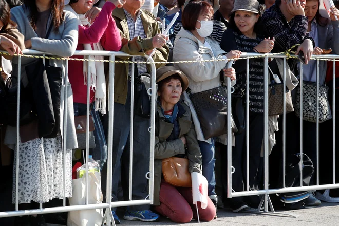 Za varnost ob današnji paradi je skrbelo 26.000 policistov. FOTO: Kim Hong-ji/Reuters