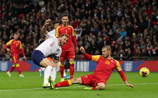 Harry Kane je še drugič zapored v domači kvalifikacijski tekmi zabil trojček. FOTO: Reuters