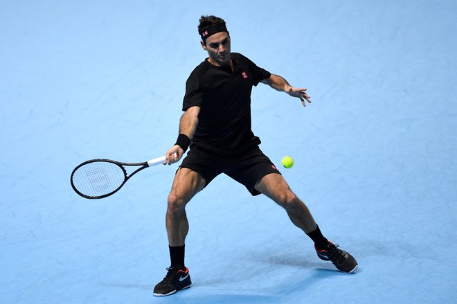 Roger Federer se od sklepnega turnirja osmerice tretje leto zapored poslavlja po polfinalu. FOTO: Reuters