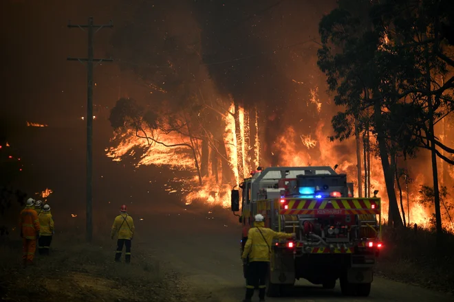 Dim se je dvignil tudi nad Sydney. FOTO: Stringer Reuters