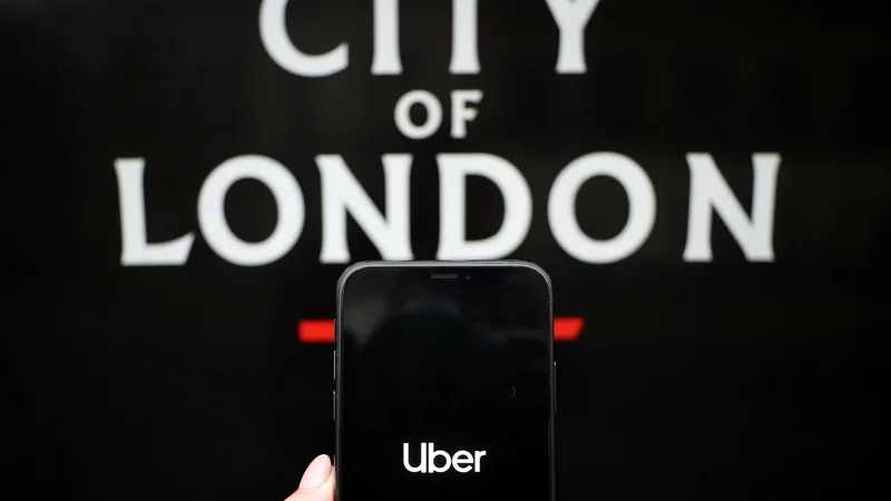 Fotografija: V Londonu je približno 45.000 voznikov Uberja. FOTO: Hannah Mckay/Reuters