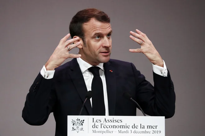 Francoski predsednik Emmanuel Macron. FOTO: Pool Reuters