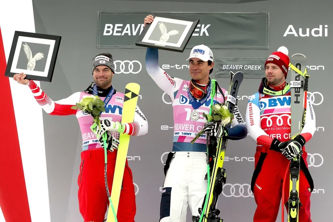 Vincent Kriechmayr, Johan Clarey in Beat Feuz so se povzpeli na oder za zmagovalce. FOTO: AFP