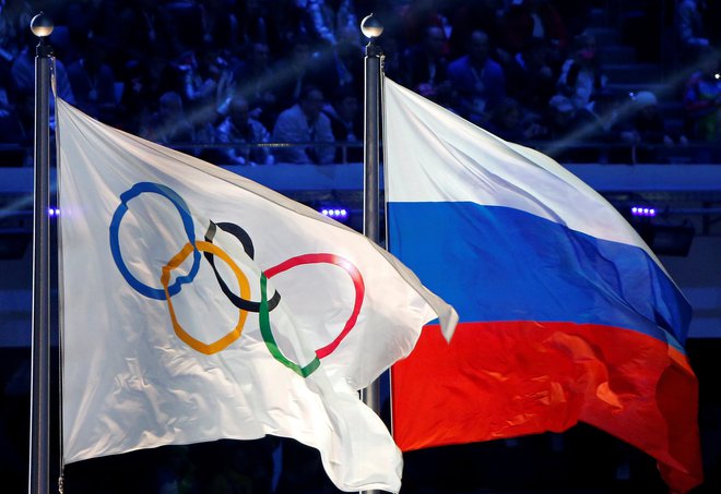 Rusi so si želeli vrnitev takšne podobe, torej da bi bila ob olimpijski zastavi tudi državna, pa v naslednjih štirih letih ne bo takšnega scenarija. FOTO: Reuters