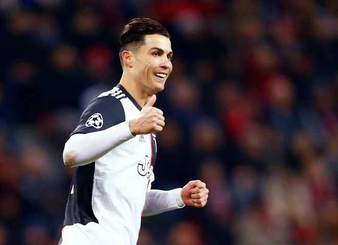 Cristiano Ronaldo je zabil v Leverkusnu že svoj 128. gol v ligi prvakov. FOTO: Reuters