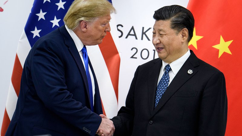 Fotografija: Predsednika ZDA in Kitajske Donald Trump in Ši Džinping konec junija v Osaki. Foto Brendan Smialowski Afp