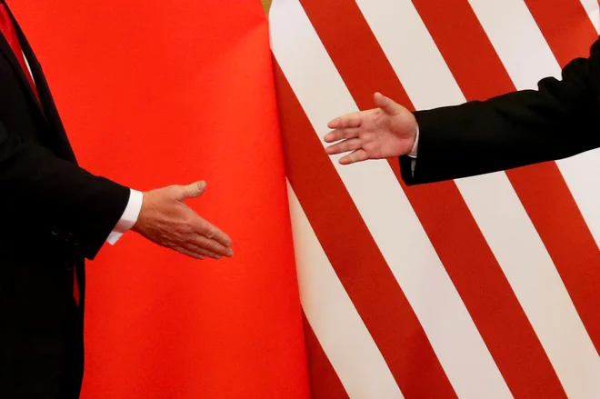 Amneriški predsednik Donald Trump in kitajski Ši Džinpeng novembra 2017 v Pekingu.&nbsp;&nbsp;Foto Damir Sagolj Reuters