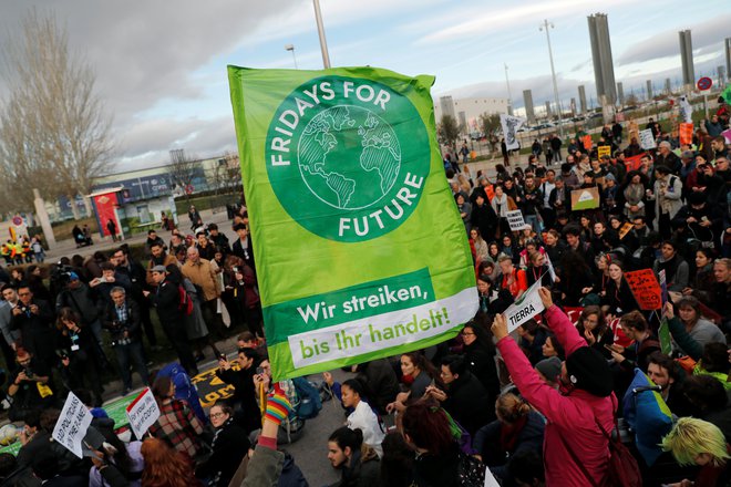 Podnebni aktivisti protestirajo. Tudi na preteklih konferencah so. FOTO: Nacho Doce/Reuters